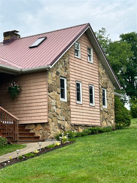 pic of white house w/ maroon metal roof|metal roof colors 2024.